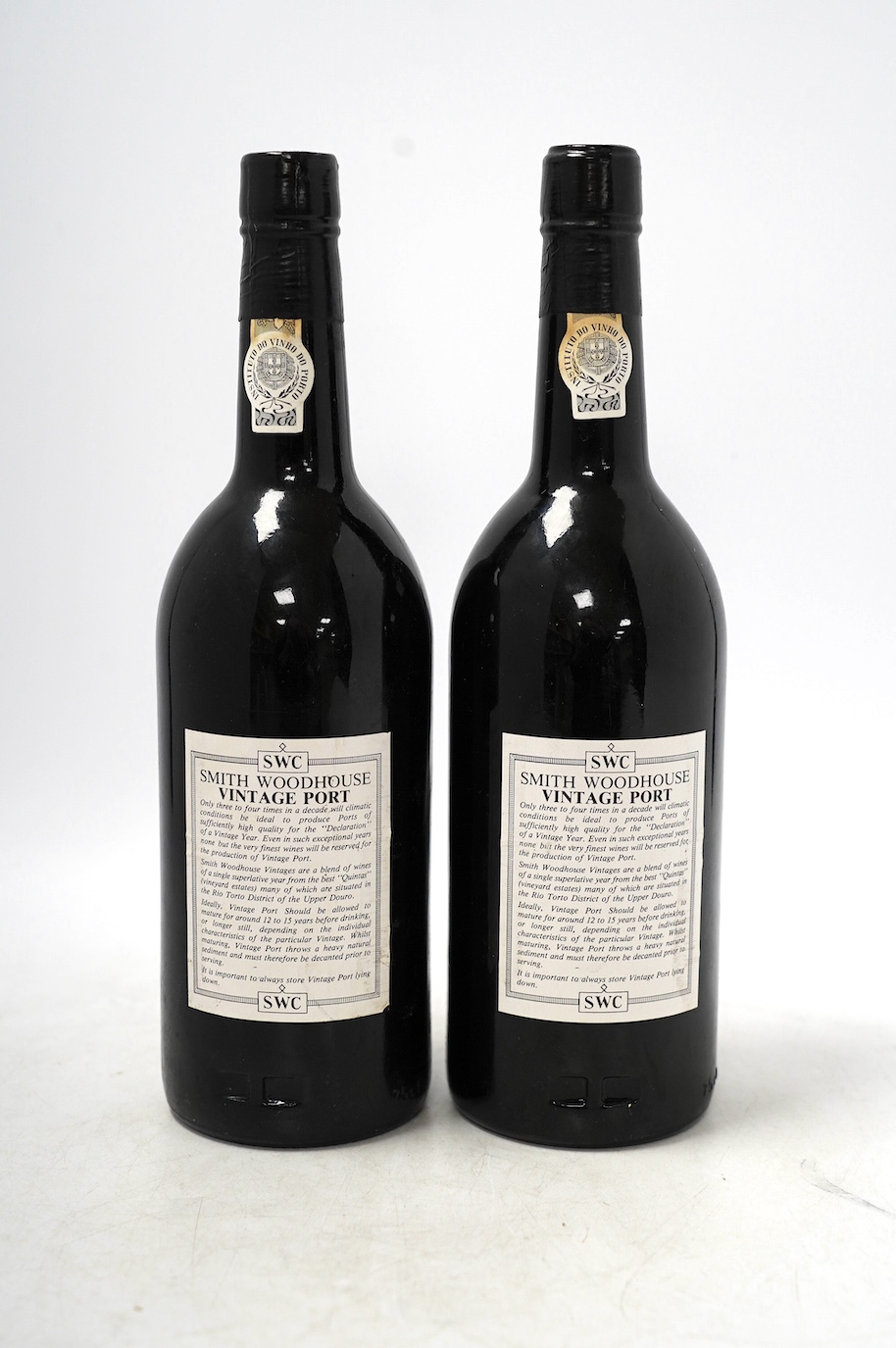 Two bottles of Smith Woodhouse 1983 vintage port. Condition - fair, storage history unknown